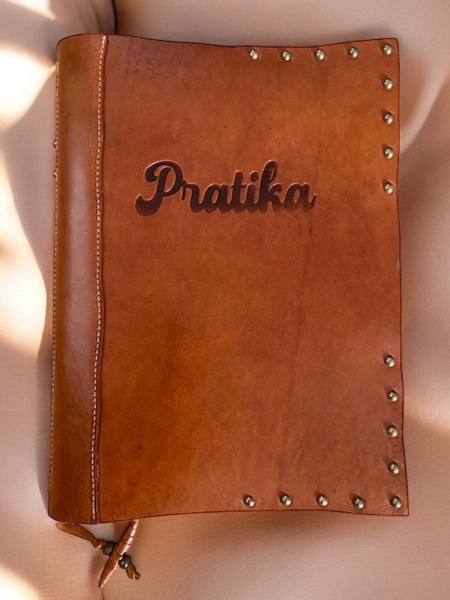 Custom leather cover for a larger Book